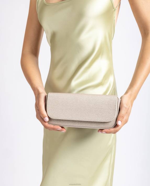 Unisa kvinnor guld partyhandväska i blankt tyg 06DT1202