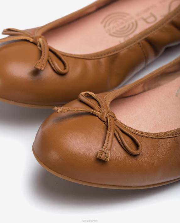 Unisa kvinnor brun läderballerinor prydda med rosett 06DT646