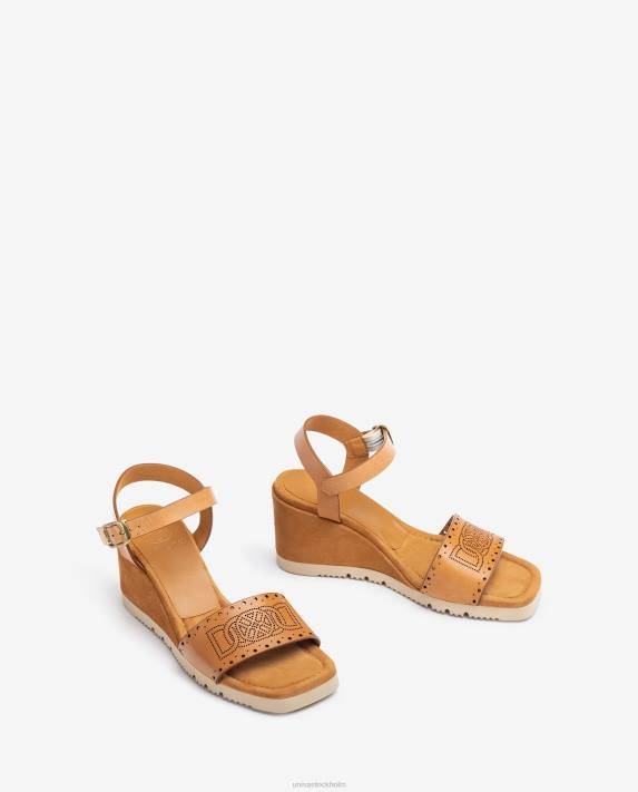 Unisa kvinnor brun sandal med dekorativa perforeringar på vampen 06DT292