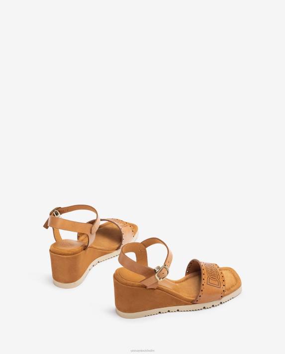 Unisa kvinnor brun sandal med dekorativa perforeringar på vampen 06DT292