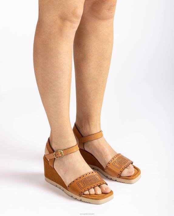 Unisa kvinnor brun sandal med dekorativa perforeringar på vampen 06DT292