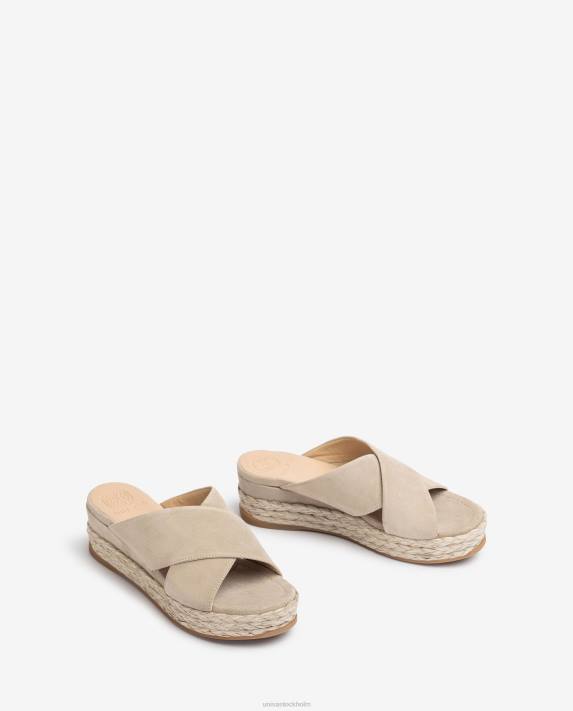 Unisa kvinnor beige mockasandal med korsade remmar 06DT813