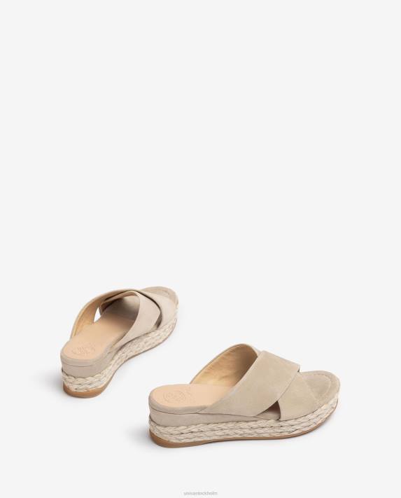 Unisa kvinnor beige mockasandal med korsade remmar 06DT813