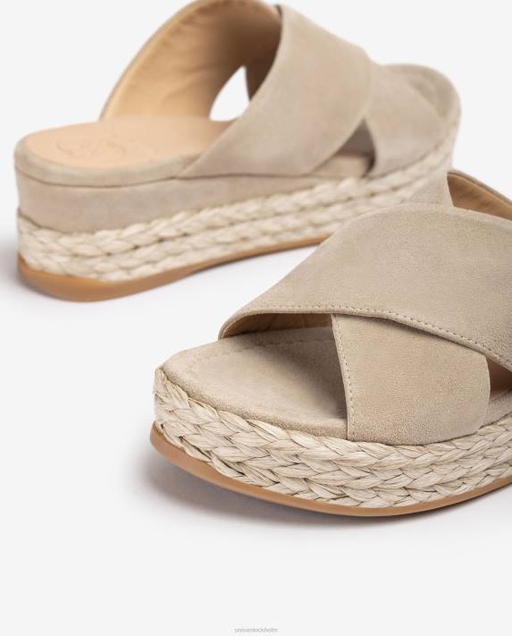 Unisa kvinnor beige mockasandal med korsade remmar 06DT813