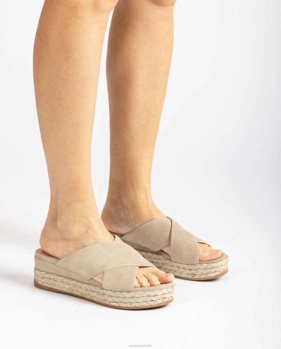 Unisa kvinnor beige mockasandal med korsade remmar 06DT813