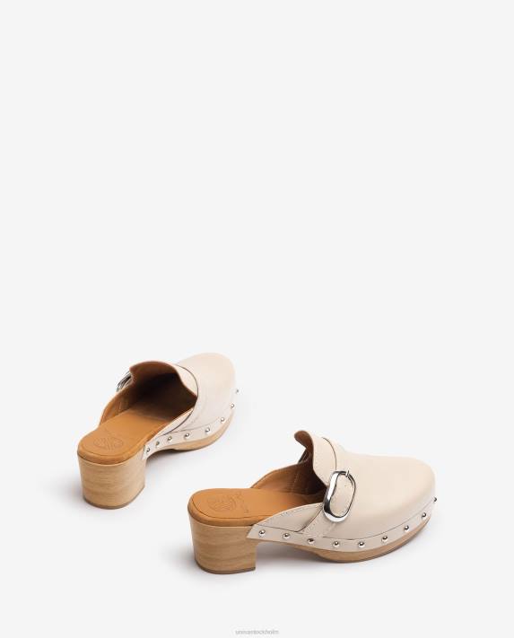 Unisa kvinnor beige mule med spänne och dubbar 06DT819