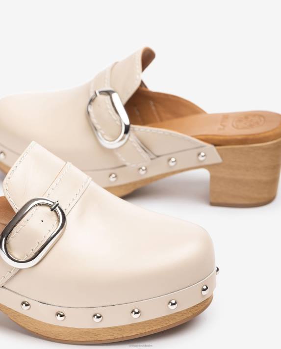 Unisa kvinnor beige mule med spänne och dubbar 06DT819