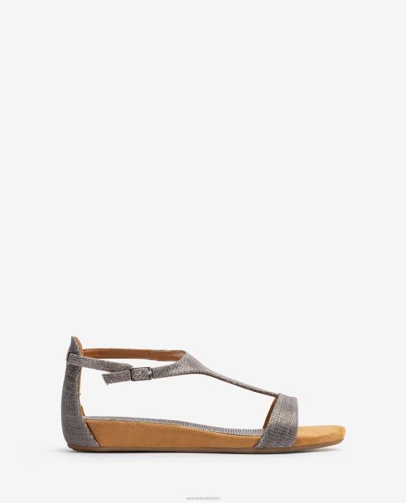 Unisa kvinnor graciös lädersandaler i metalleffekt med vristrem 06DT387