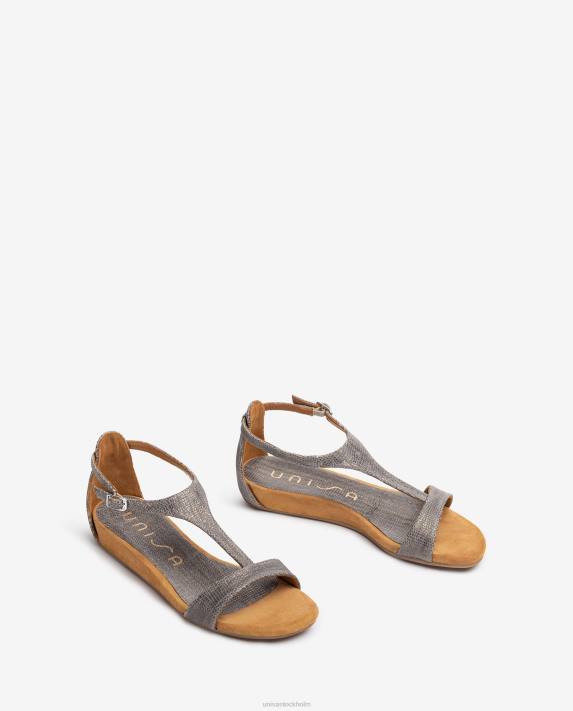 Unisa kvinnor graciös lädersandaler i metalleffekt med vristrem 06DT387