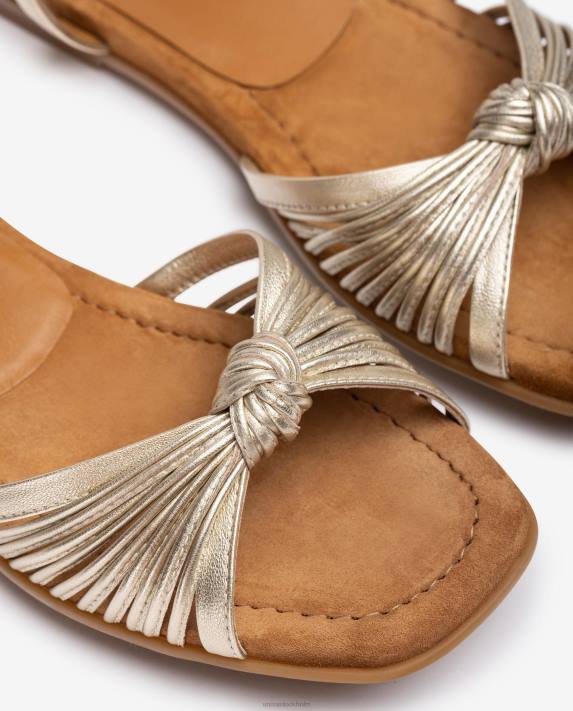 Unisa kvinnor guld platt metallisk sandal med flera remmar 06DT328