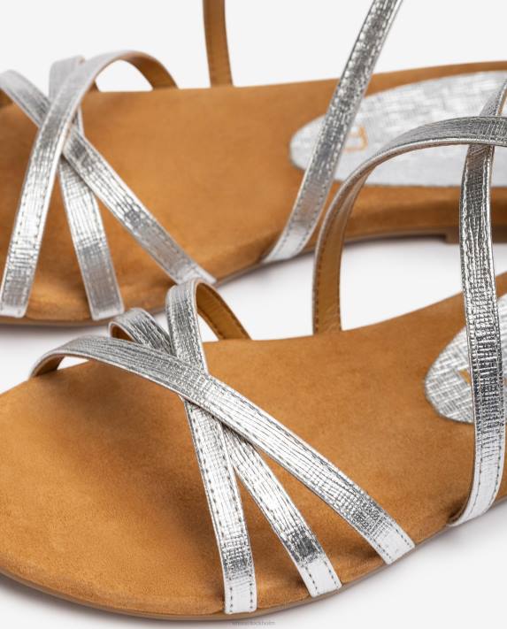 Unisa kvinnor silver platta sandaler i metalliserat läder 06DT391