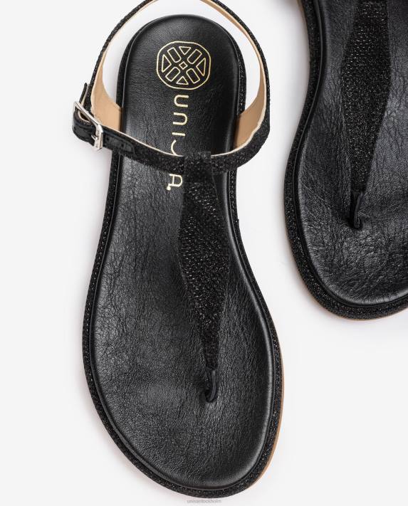 Unisa kvinnor svart tåstolpssandal i glänsande tyg 06DT26