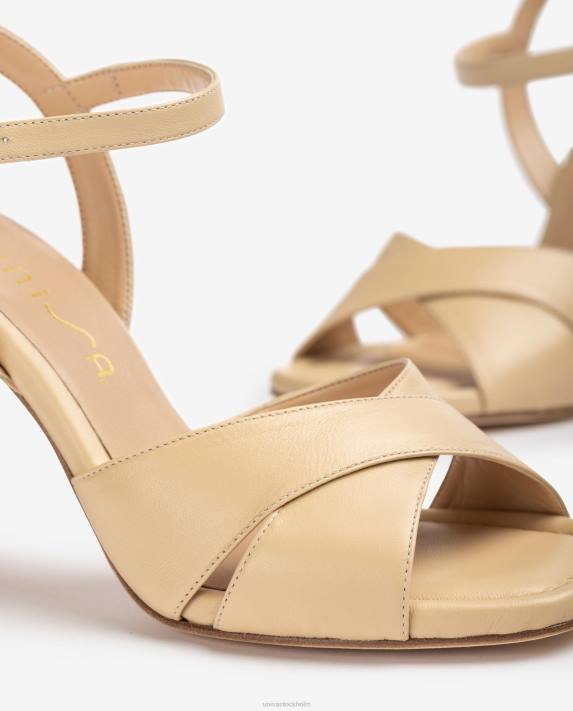 Unisa kvinnor beige sandaler med korsade läderband 06DT339