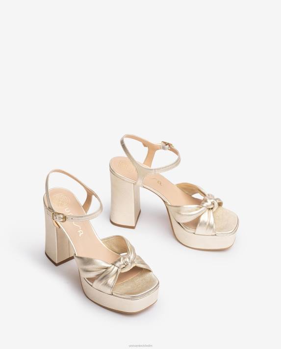 Unisa kvinnor guld sandal med fyrkantig tå med knut framtill 06DT50