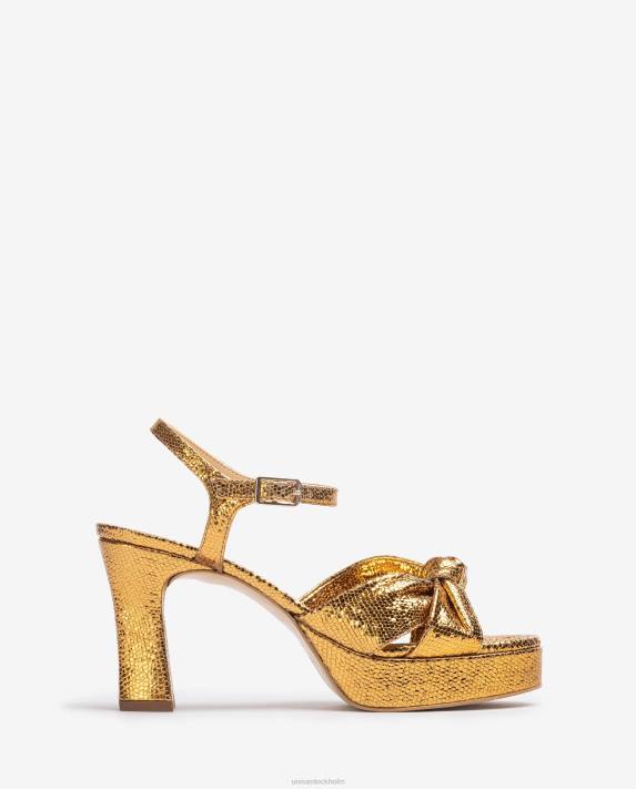 Unisa kvinnor guld sandal med knutna remmar 06DT1308