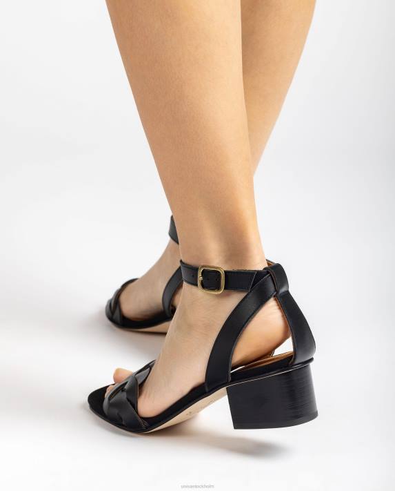 Unisa kvinnor svart sandal med dekorativa perforeringar på vampen 06DT305