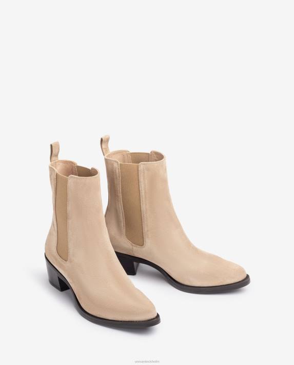 Unisa kvinnor beige cowboystövel i mocka med kilar 06DT915