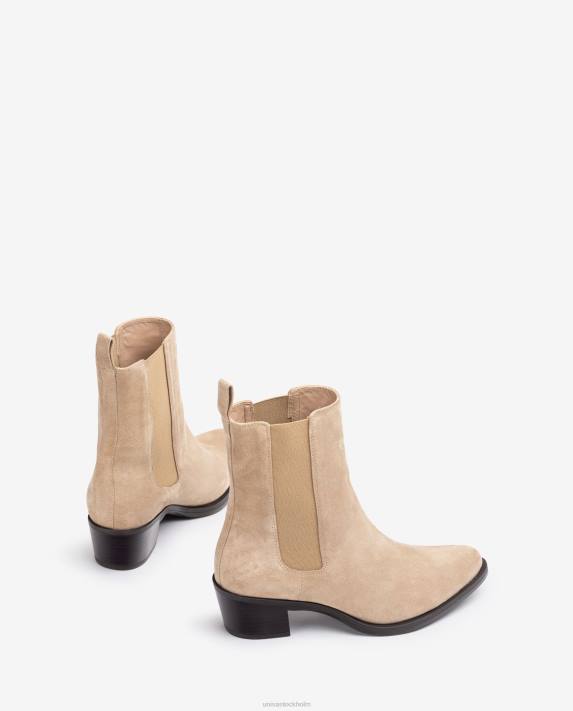 Unisa kvinnor beige cowboystövel i mocka med kilar 06DT915