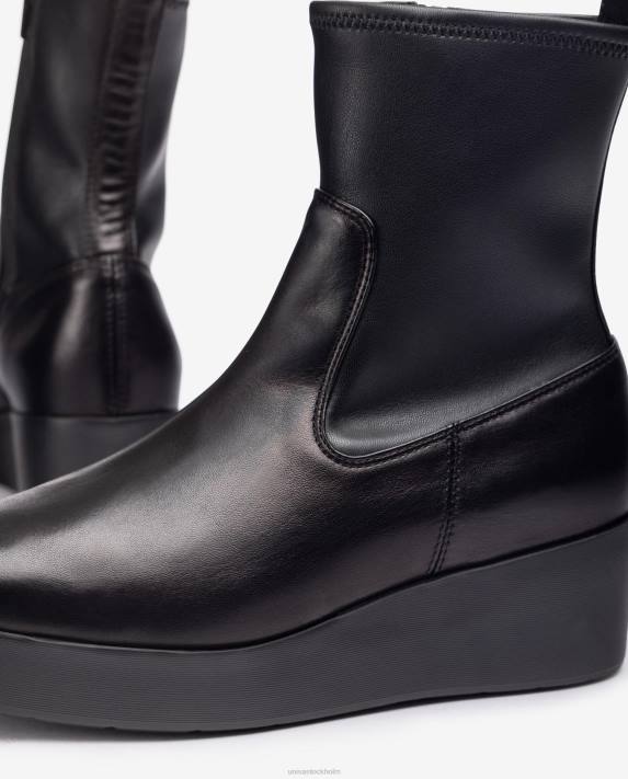 Unisa kvinnor graciös superlätt stövel med en kvartsöverlinje i stretchtyg 06DT902