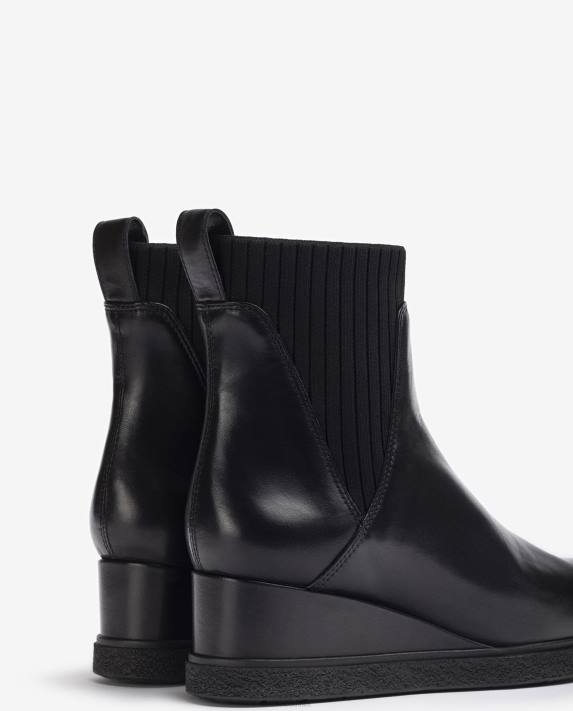 Unisa kvinnor mode ankelstövel i läder med kil 06DT945