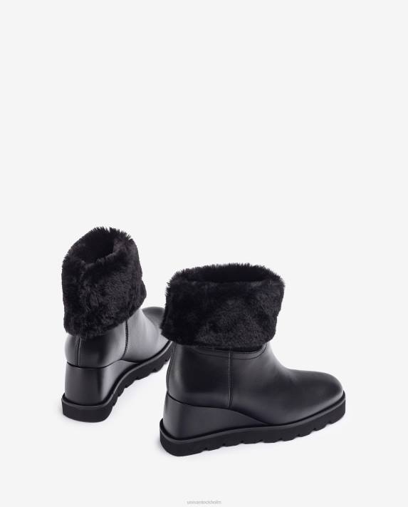 Unisa kvinnor svart ankelkänga med kil och varmt foder 06DT962