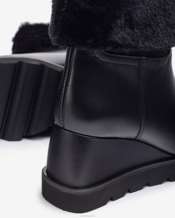 Unisa kvinnor svart ankelkänga med kil och varmt foder 06DT962