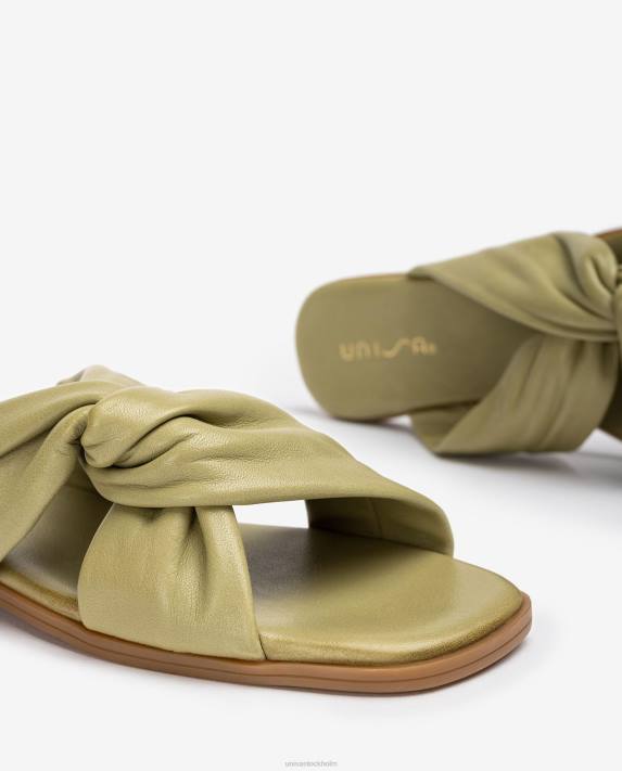Unisa kvinnor grön platt sandal med korsband 06DT64