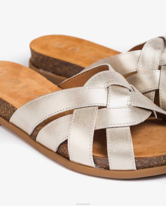 Unisa kvinnor graciös platt orm effekt läder mulor 06DT430